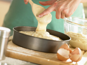 Pouring Cake Mixture Into Baking Tin